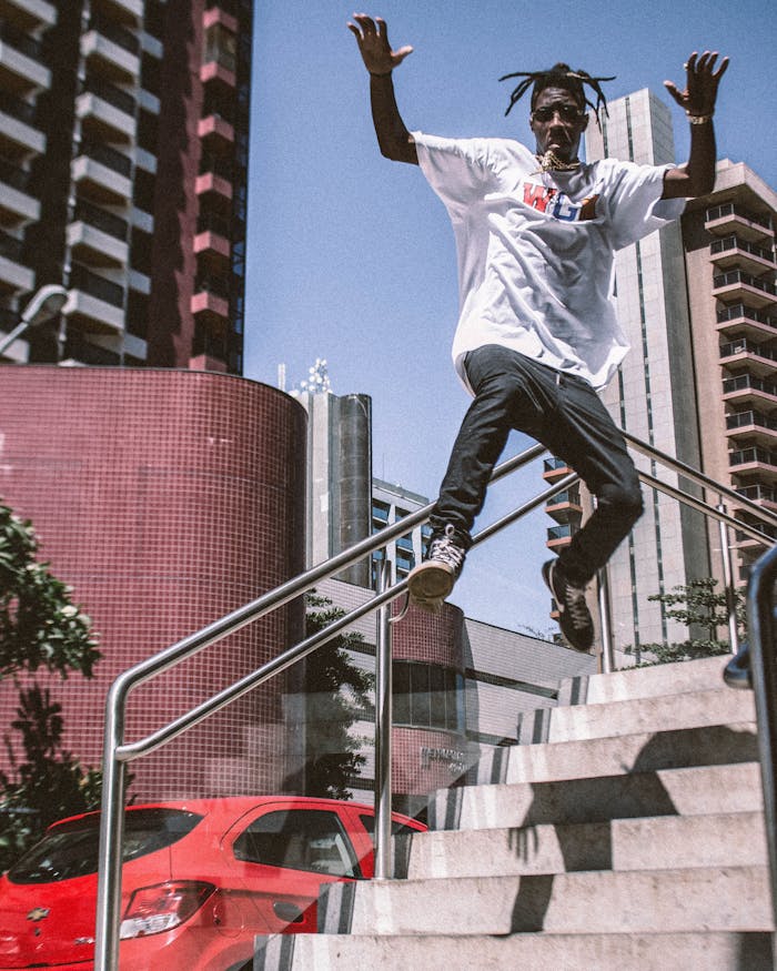 Photo of Man Jumping of Stairs